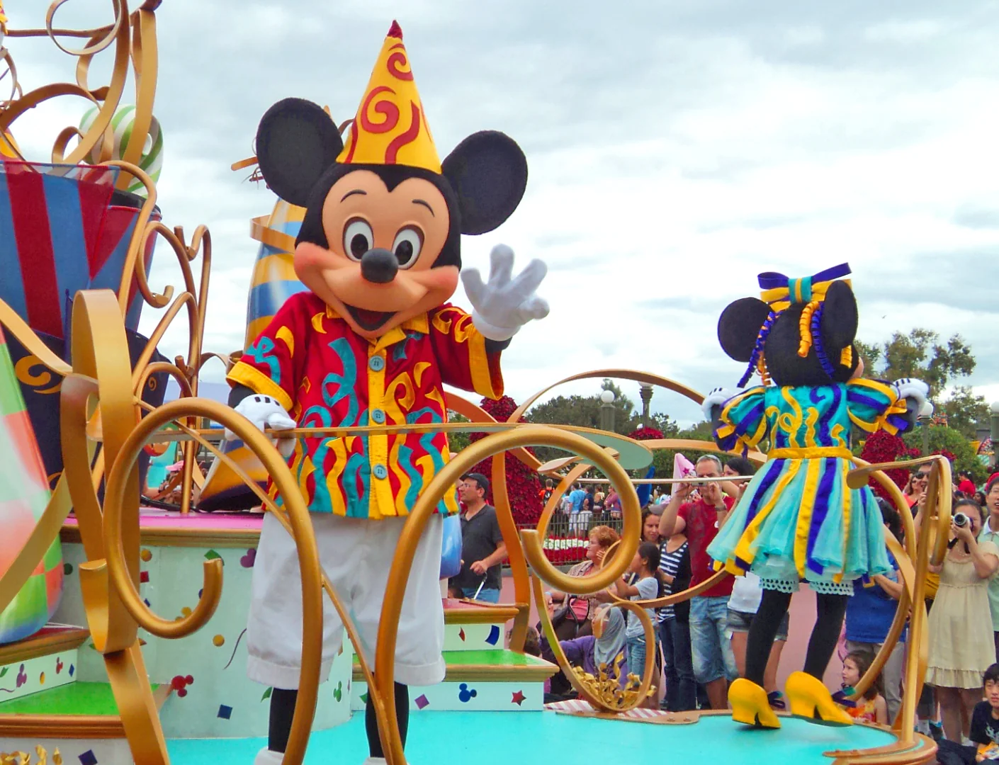 Mickey Mouse in a Walt Disney World parade during a trip using the Disney 4-Park Magic Ticket 2027